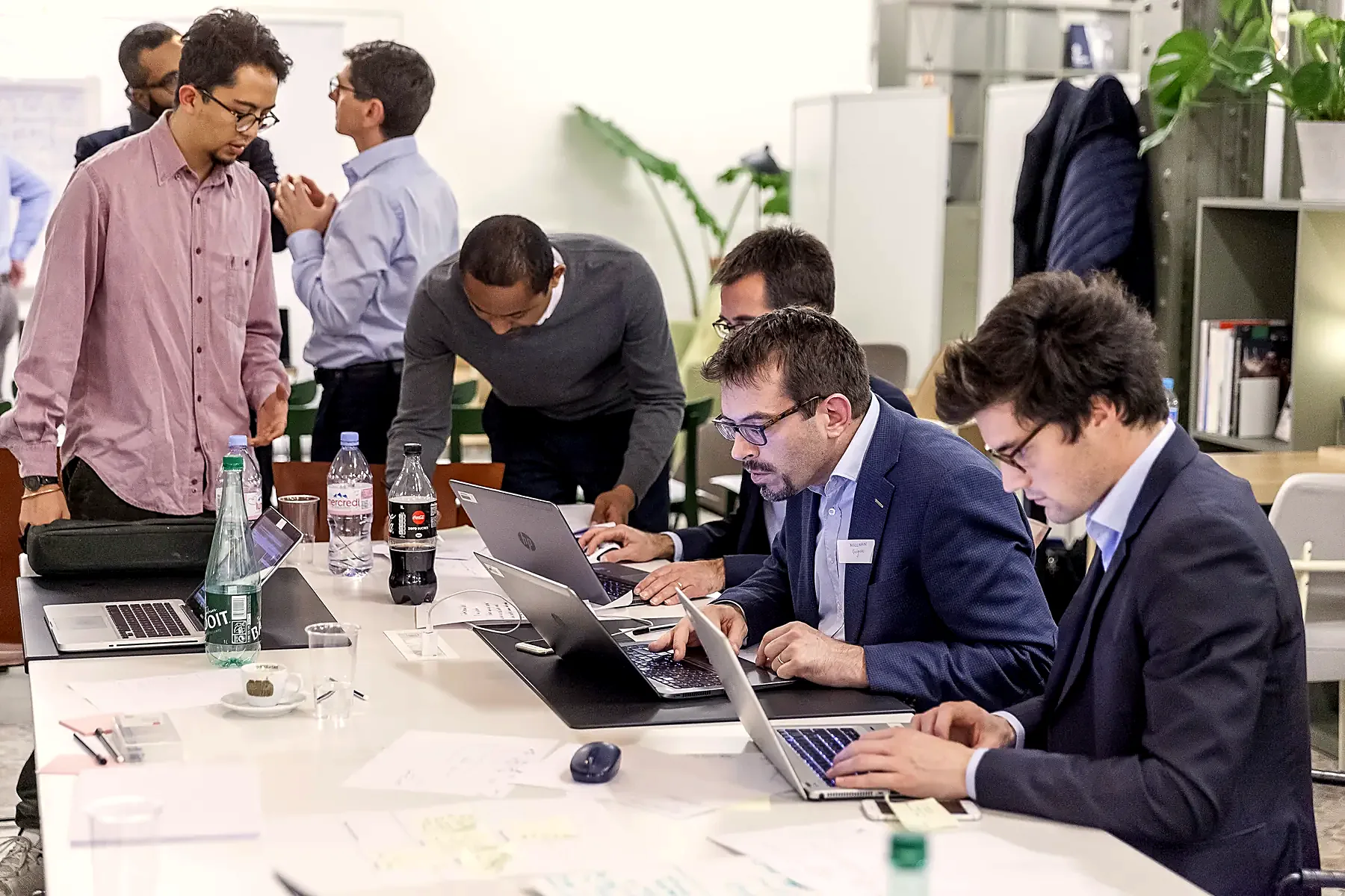 Corporate teams in the middle of a challenge