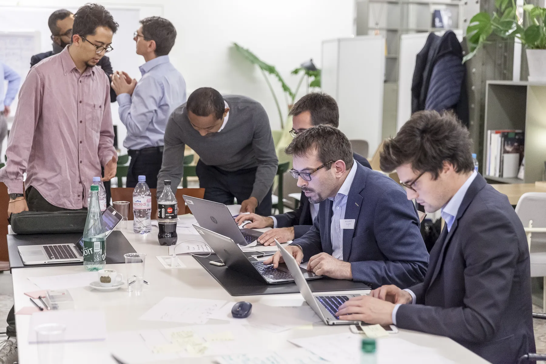 Corporate teams in the middle of a challenge
